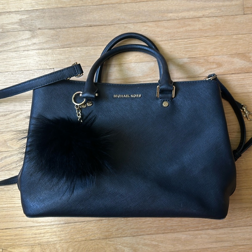Michael Michael Kors black purse with Pom Pom